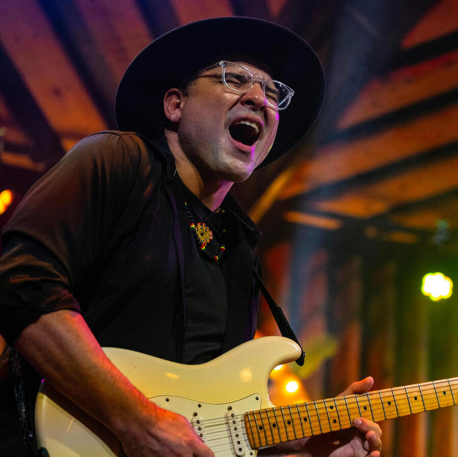 Everton Vidal Azevedo performing live on stage at Sugarshack Downtown, photographed by Kevin Bires.